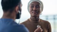 Patient has heart checked by doctor
